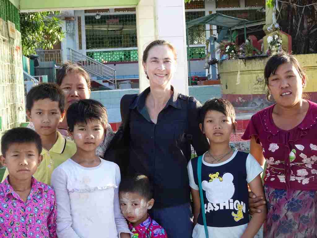 A photo with a local family in Hpa An Myanmar