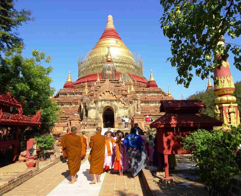 monks entering the Damma Ya Za Ka Pagoda, Bagan, Myanmar