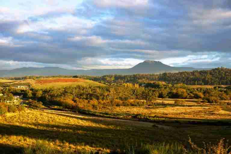 Fly drive Tasmania and enjoy a sunset view of Cradle mountain