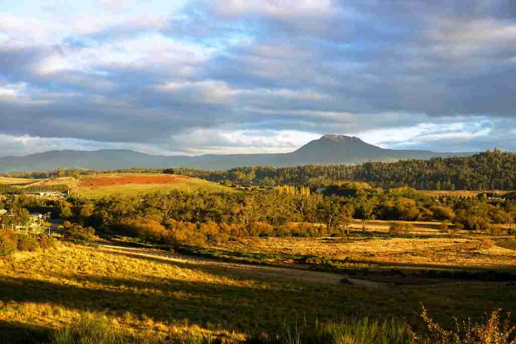 Fly drive Tasmania and enjoy a sunset view of Cradle mountain
