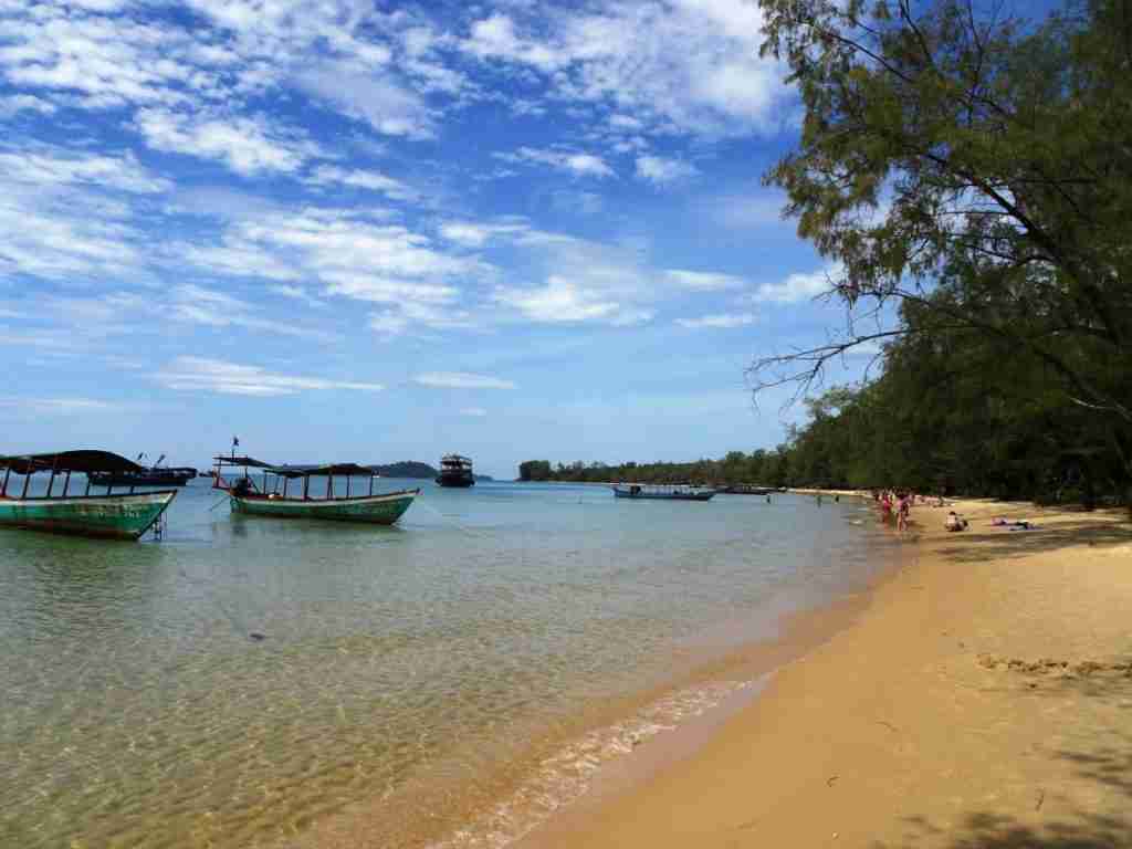 small baots moored off the beach at Ko Ta Tiev, Cambodia