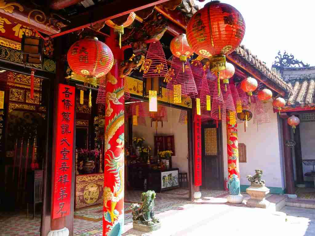 Chinese Temple with coils of insence hanging from the roof in Hoi An Vietnam