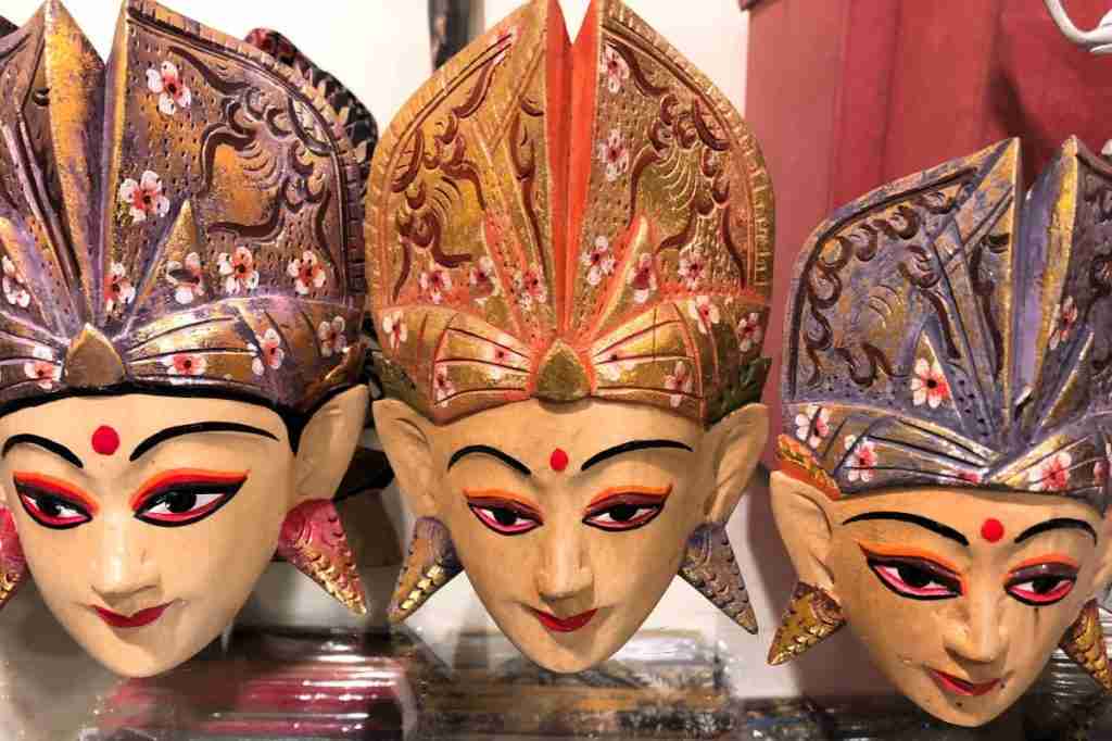Bali vs Thailand Balinese dancers colourful carvings