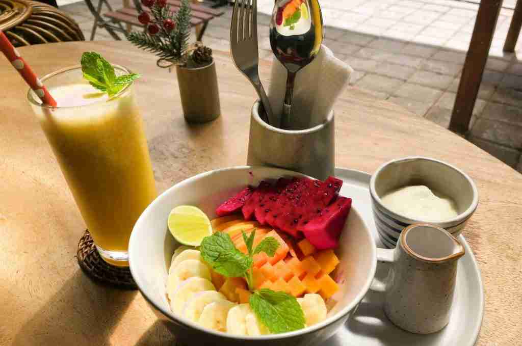 A breakfast smoothie bowl in Bali in June with colorful tropical fruits