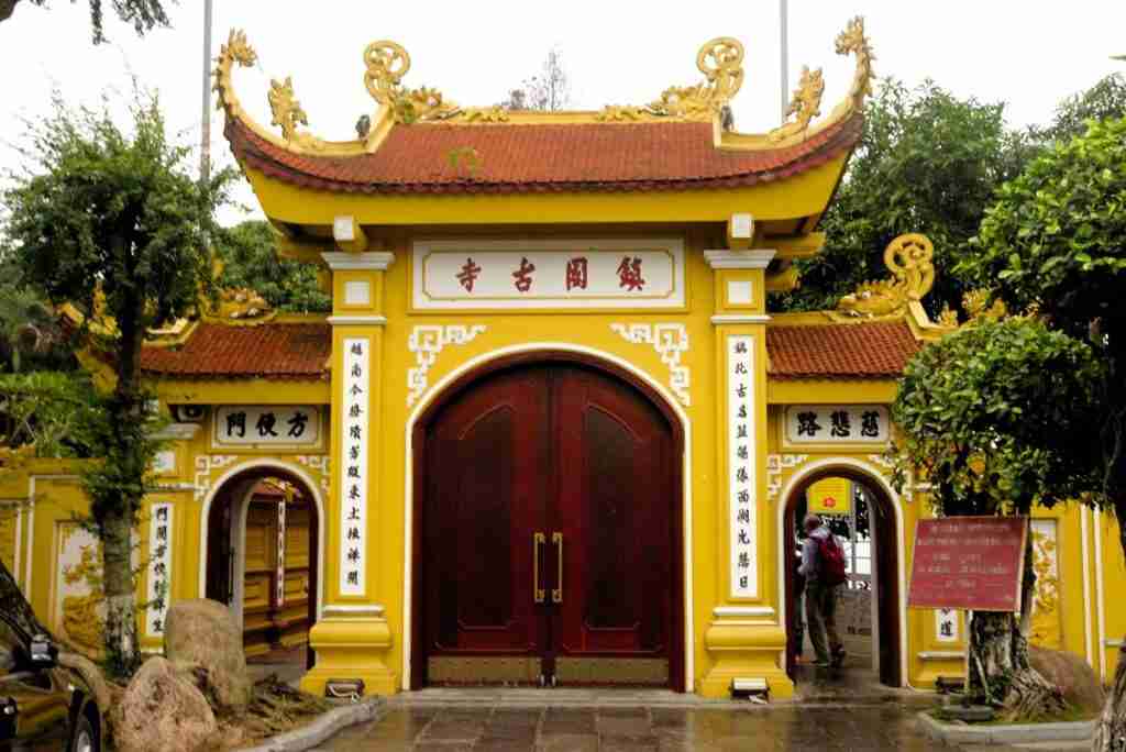 Yellow Temple entrance traditional Vietnamese roof design, Hanoi