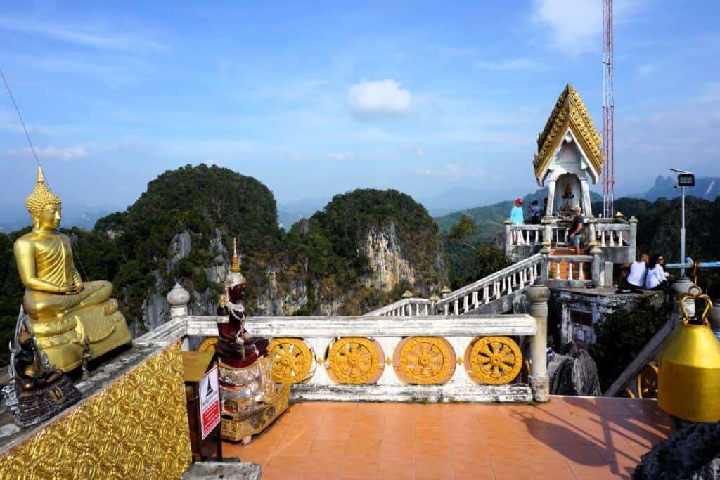 Golden Buddha at the top of the mountain at the Tiger Cave Temple in Krabi Thailand