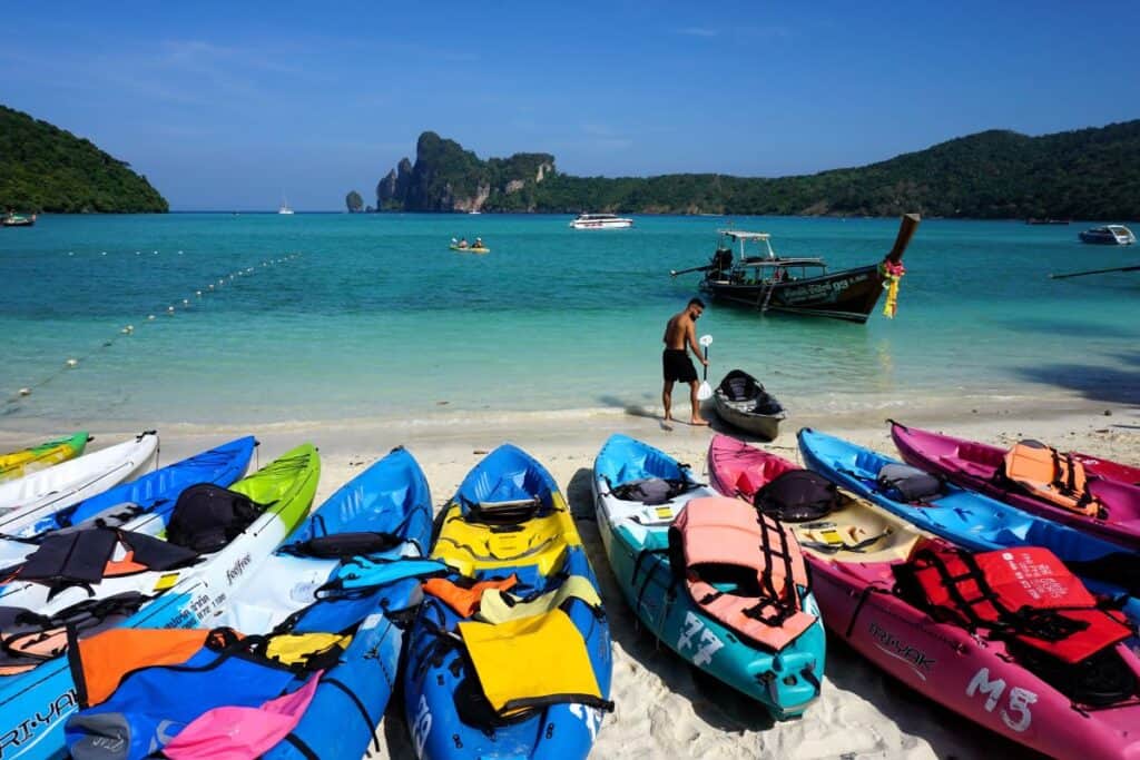 Colourful kayaks on the beaches of beautiful Phi Phi island in Thailand