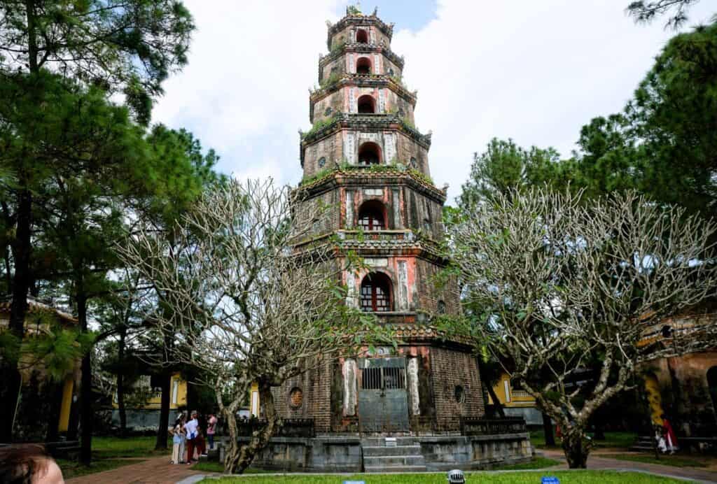octagonal Buddhist pagoda with 8 stories surrounded by trees