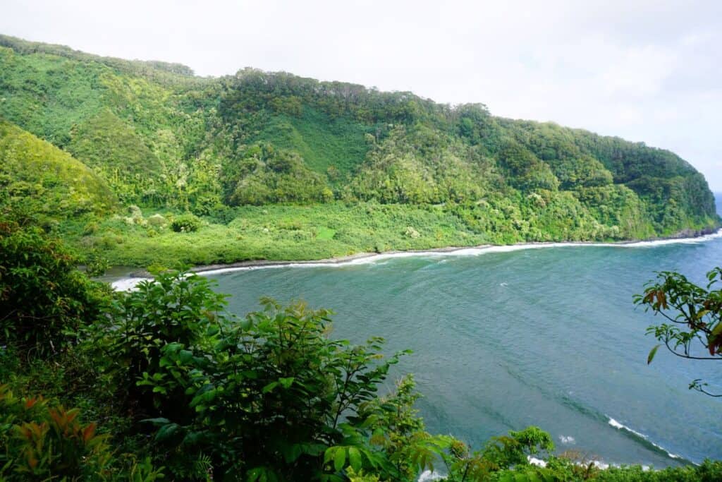 Green rainforest meets the blue ocean on the Road to Hana, Maui